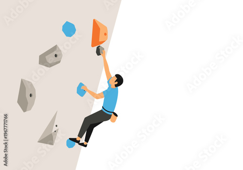 Man Climbing Indoor Rock Climbing Wall with Colorful Holds.