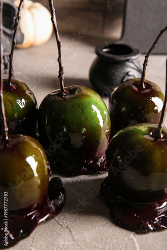 Tasty caramel apples for Ha...