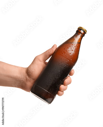 Woman holding bottle of col...