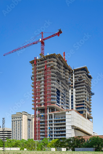 High rise building under construction with tower crane in Tampa Florida USA