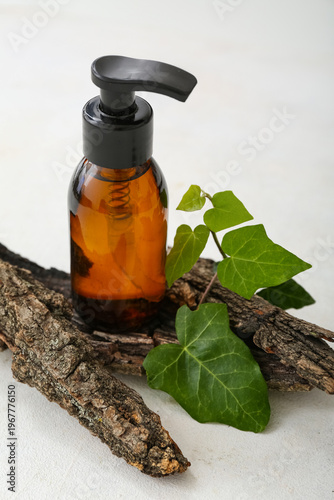 Bottle of cosmetic oil with...