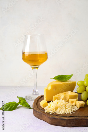 Wooden board with tasty Swi...