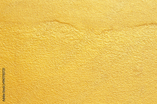 Gold cement wall bright background