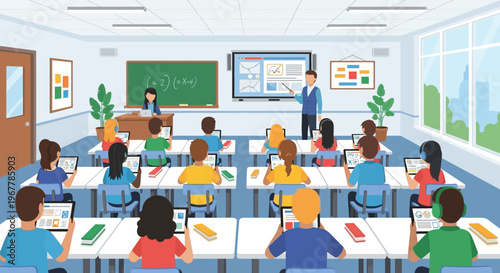 Diverse Students Actively Learning with Laptops and Tablets in a Modern Classroom, Guided by a Male Teacher with an Interactive Screen.