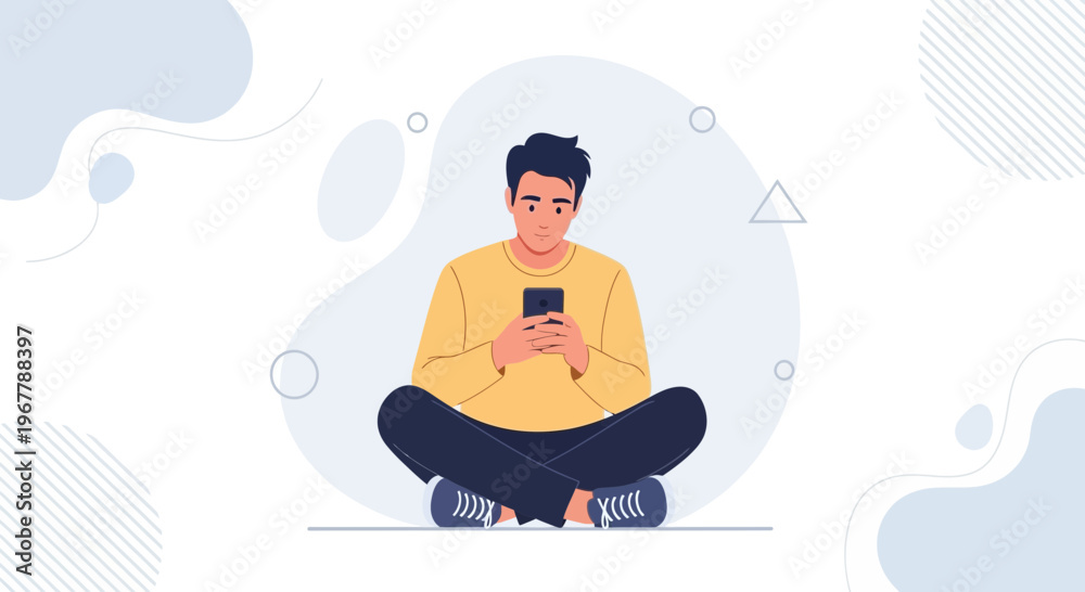 Obraz premium Young man sitting cross-legged, looking at smartphone, modern abstract background