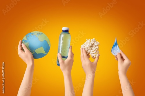 Hands holding model of Eart...