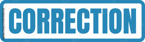 Blue sign with the word correction prominently displayed for emphasis.
