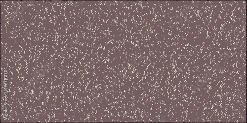 Abstract texture of reddish brown granular material with speckled highlights