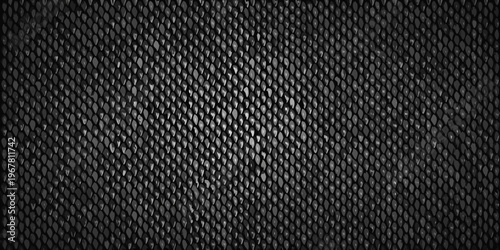 A close up view of a dark textured mesh or netting pattern