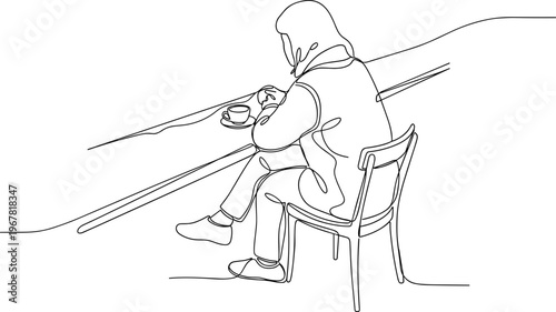 Person sitting on a chair playing.