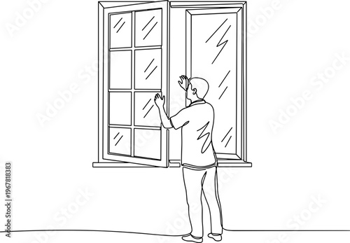 Man cleaning window with squeegee tool.