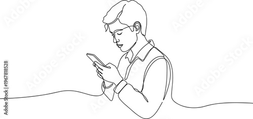 Young man using mobile phone.