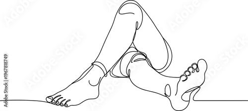 Woman sitting on floor with legs.