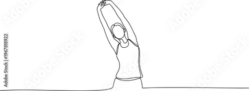 Woman stretching her arms up high.