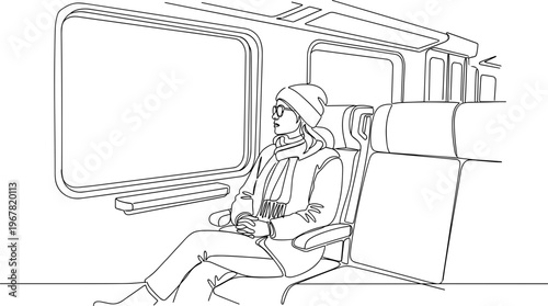 Woman sitting on a train seat.
