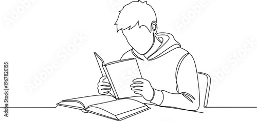Young man reading a book.
