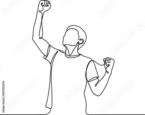 Man celebrating with raised arm.
