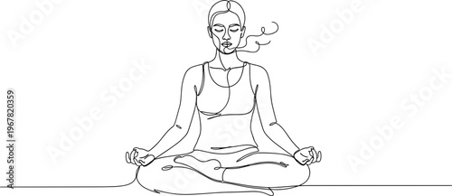 Woman in meditation sitting cross legged.