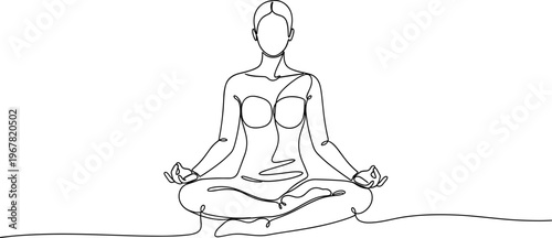 Woman meditating in lotus position.