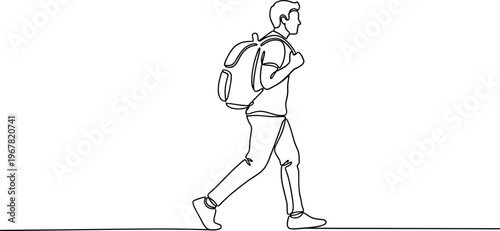 Young man walking with backpack.