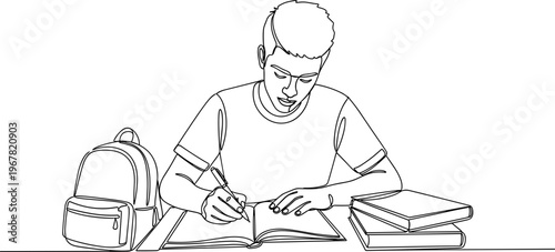 Young man studying with books.