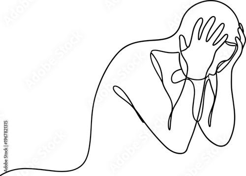 Person covering face with hands.