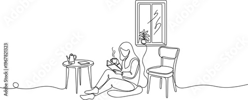 Woman sitting on floor with laptop.