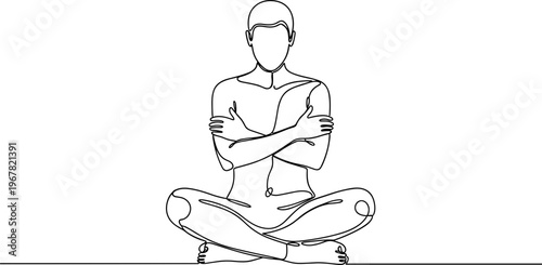 Man sitting in yoga position crossed arms.