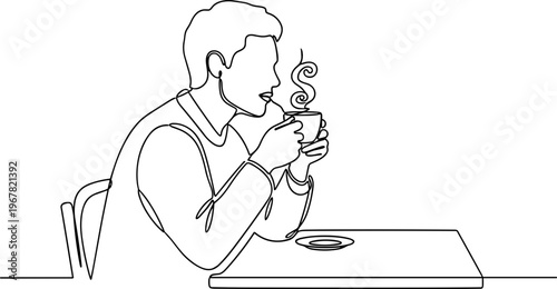 Man sitting at table with coffee.
