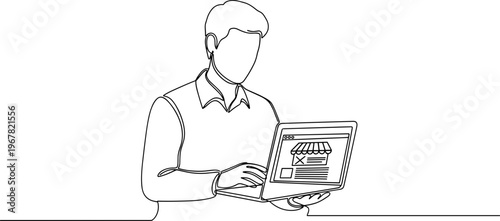 Man working on laptop computer.