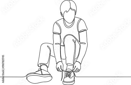 Man tying his shoelaces on floor.