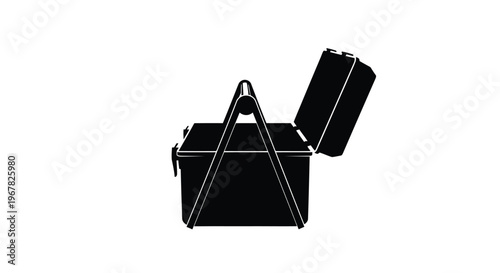 A black and white silhouette of an open picnic basket