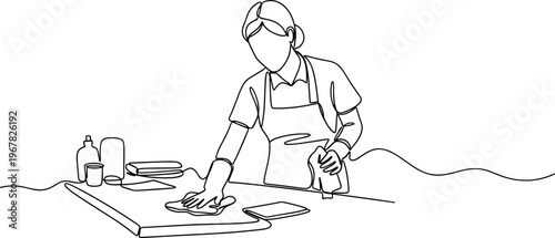 Adult man in apron preparing food.