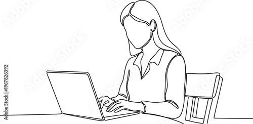 Woman working on laptop computer.