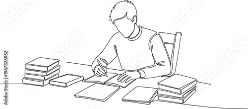 Man sitting at desk with books.