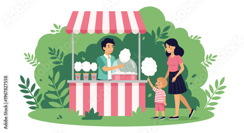 Happy family with a small child buying white cotton candy from a vendor at a pink and white striped carnival stall at the fair.
