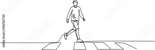 Man crossing the street quickly alone.