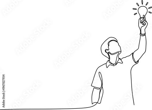 Man holding up a light bulb.