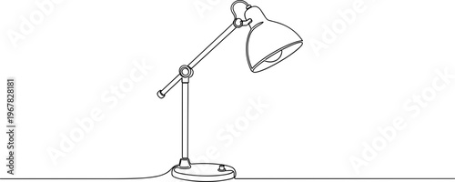 Desk lamp on a table surface.