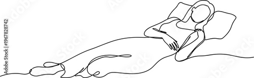 Woman lying on a bed sleeping.