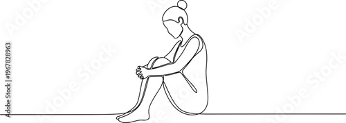 Sad woman sitting alone depressed.