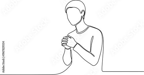 Man holding cup in hands.