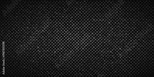 Dark textured background resembling woven carbon fiber or fabric