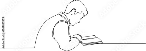 Man reading a book alone.