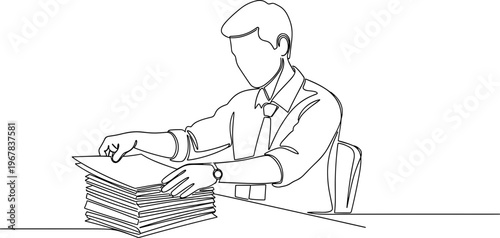 Man sitting at desk with paperwork.