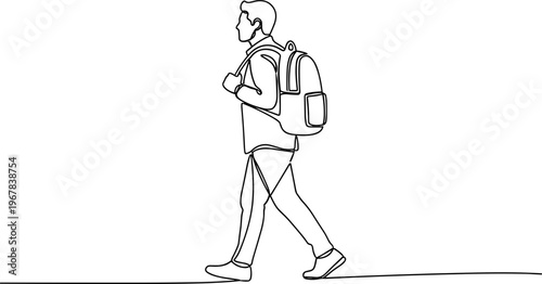 Young man walking with backpack.