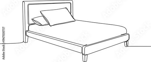 Bed with white sheets and pillows.