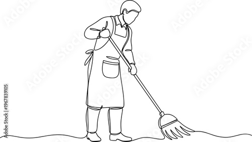 Man wearing apron using rake outdoors.