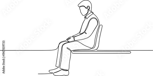 Man sitting on a chair alone.