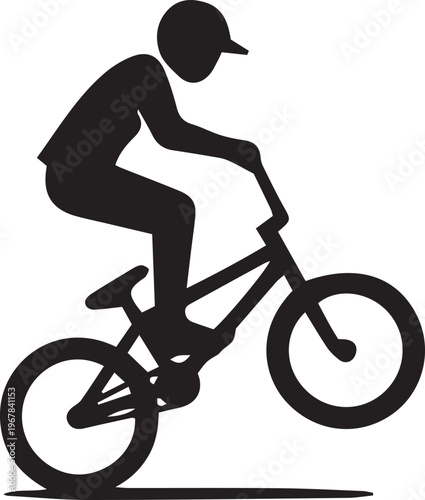 Action Silhouette of a BMX Rider Performing a Wheelie Trick on a Stunt Bike